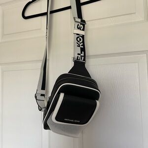 Michael Kors Two-Tone Black and White Cooper Medium Sling Pack NWT
